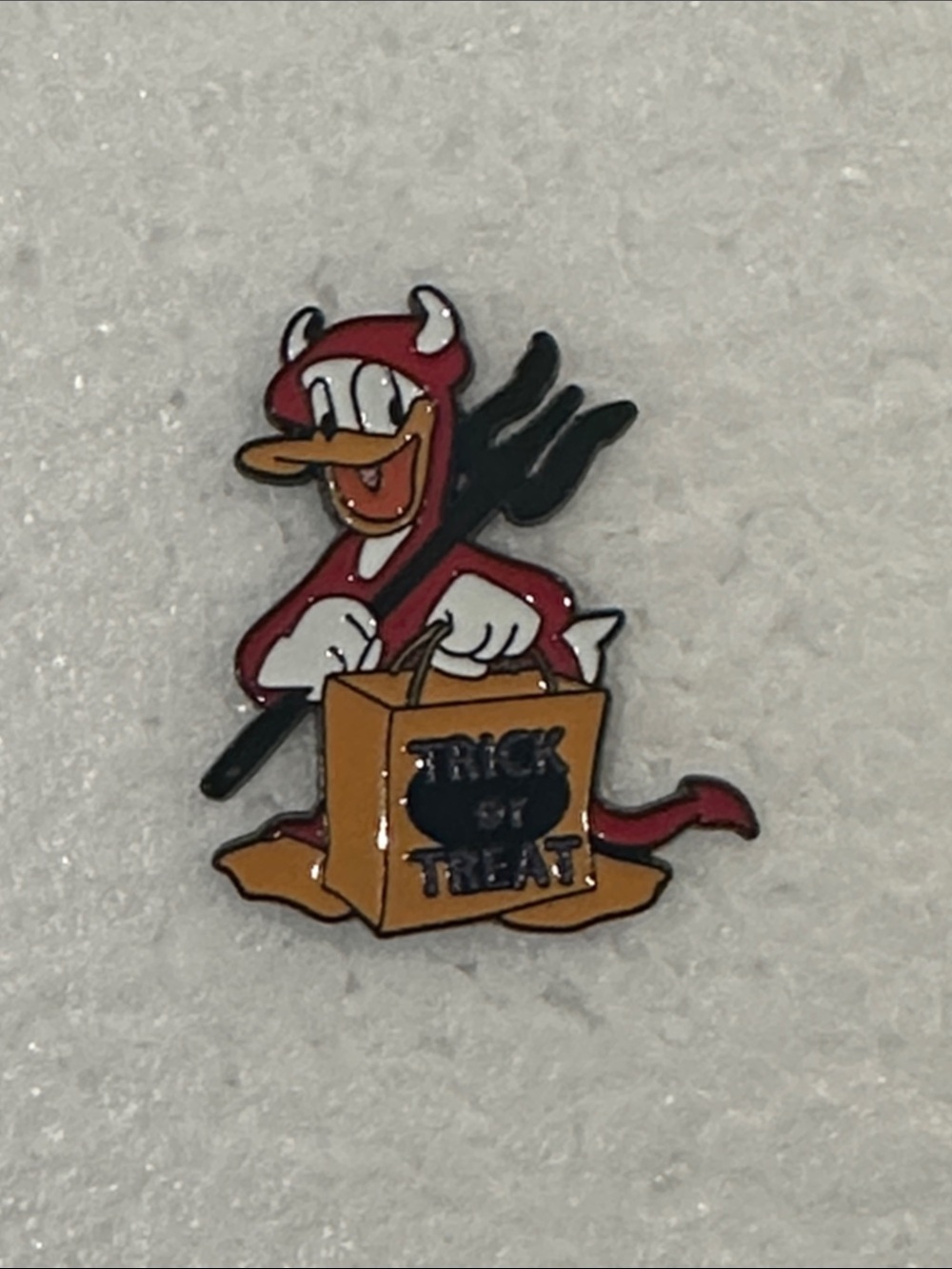 Disney Red Devil Donald Duck Enamel Pin with Orange Trick-or-Treat Bag